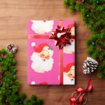 Papier Cadeau Christmas Jolly Père Noël Joyeux Pink Fun<br><div class="desc">Un visage de Père Noël joyeux sur un arrière - plan de Noël rose. Amusant et enjoué de reconnaître la saison de Noël.</div>