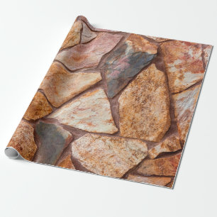 Papier Cadeau Closeup of a stone wall as a backgroundwallpaper,p
