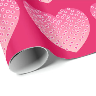 Papier Cadeau Coeurs dans les teintes de rose douce sur un dossi