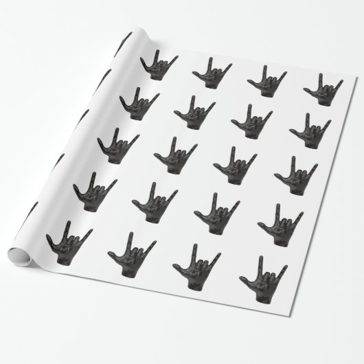 Papier Cadeau cornes diable main (Déroulé)