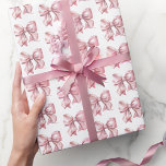 Papier Cadeau Cute Coquette Blush Pink Bow Motif<br><div class="desc">Papier d'enveloppement de la corbeille rose Aquarelle. Ajoutez une touche de charme à vos cadeaux avec ce papier d'emballage mignon et simple avec un motif d'arc rose-en-ciel. Son joli design est parfait pour les baby showers, les douches nuptiales ou les anniversaires, que ce soit pour une petite fille, une femme...</div>