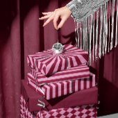 Papier cadeau de Noël à rayures rose rouge