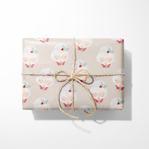 Papier cadeau de Noël aux visages beige de Mme Cla