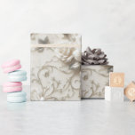 Papier Cadeau Elégant Rose ivoire avec design floral argent<br><div class="desc">Enveloppez vos cadeaux dans une élégance intemporelle avec ce luxueux papier d'emballage rose en ivoire. Doté de roses délicatement gaufrés aux accents argentés doux et de vignes florales tourbillonnantes, ce design respire le raffinement et la romance. Parfait pour les mariages, les anniversaires, les douches nuptiales, ou toute occasion où vous...</div>