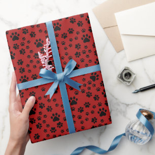 Papier Cadeau Empreintes de pattes noirs en rouge