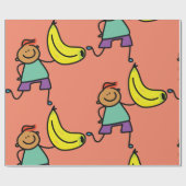 Papier Cadeau Enfant Joueur tenant une grande banane jaune (Plat)
