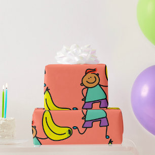 Papier Cadeau Enfant Joueur tenant une grande banane jaune