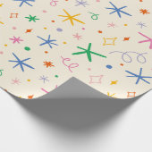 Papier Cadeau étoiles joueuses et tourbillonne motif coloré (Coin)