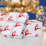 Papier Cadeau Festif moderne Nordic Christmas Red Deer<br><div class="desc">silhouettes de rennes sautants d'art populaire sur blanc et rouge,  parfait pour la fête de la saison cadeau envelopper</div>