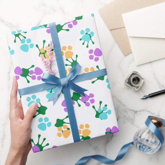 Papier Cadeau Fêtes de Noël imprimé et pattes vert (Cadeaux)