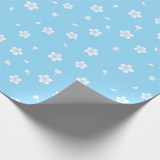 Papier Cadeau Fleurs blanches sur Motif bleu bébé (Coin)