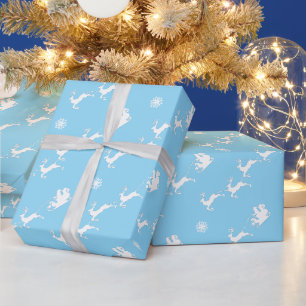 Papier Cadeau Flocon de neige et Père Noël avec traîneau sur BLE