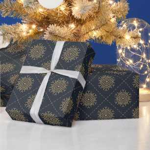 Papier Cadeau Flocons de neige dorés élégants sur un Noël bleu