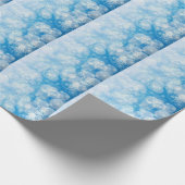 Papier Cadeau Flocons de Noël sur un fond bleu       (Coin)