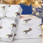 Papier Cadeau Funny Christmas T-Rex Personnalisé<br><div class="desc">Drôle personnalisé Noël Dinosaure enveloppement Papier T-Rex Santasaurus Noël blanc Enveloppement cadeau Faire vos cadeaux de vacances rugir de rire! Ce papier d'emballage personnalisé en dinosaure de Noël présente un pittoresque Tyrannosaurus rex psychédélique coloré habillé en Père Noël (alias "santasaurus") dans un design rouge festif. Parfait pour les enfants, les...</div>