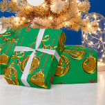 Papier Cadeau Golden Baubles and Snowflakes Green Christmas<br><div class="desc">This green and gold Christmas wrap has a pattern of golden Christmas tree baubles and red and orange snowflakes,  all on a festive green background.</div>