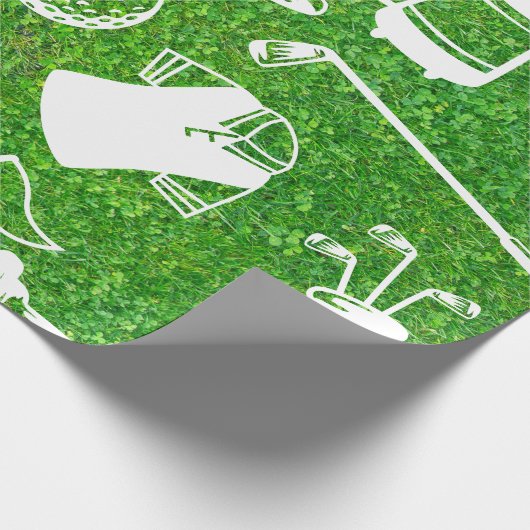 Papier Cadeau Golf equipment on green grass background (Coin)
