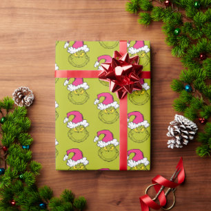 Papier Cadeau Grinch avec un chapeau de Père Noël rose