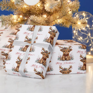 Papier Cadeau Joli vache Highland de Noël avec des bois festifs
