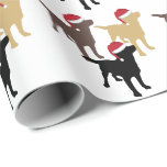 Papier Cadeau Labrador Retrivers In Santa Hat Christmas<br><div class="desc">Labrador retriever .. noir,  jaune et chocolat coloré tous portant chapeaux de Père Noël rouge .. amoureux des chiens thème papier d'emballage de Noël de Ricaso</div>