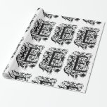 Papier Cadeau Monogramme E Motif initial noir et blanc cupide<br><div class="desc">Monogramme E Le papier d'emballage initial à motif floral cuppé noir et blanc peut être customisé avec une image, un nom, un texte, un logo ou une photo. Changez l'arrière - plan blanc à n'importe quelle nuance de bleu, vert, jaune, orange, rose, rouge, marron et violet. Idéal pour envelopper Noël,...</div>