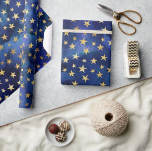 Papier Cadeau Motif bleu aquarelle avec étoiles dorées