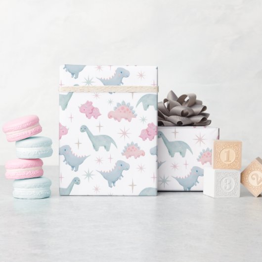 Papier Cadeau Motif de dinosaures roses (Baby Shower)