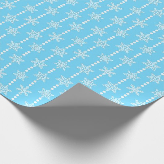 Papier Cadeau Motif de flocons de neige bleu clair et blanc (Coin)