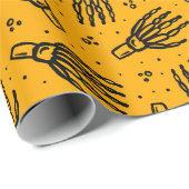 Papier Cadeau Motif de main de squelette. (Coin rond)