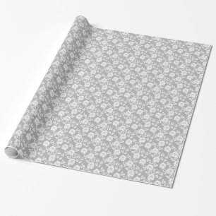 Papier Cadeau Motif en dentelle blanche sur arrière - plan gris