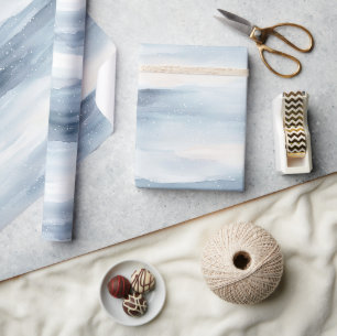 Papier Cadeau Noël aux flocons blancs bleus