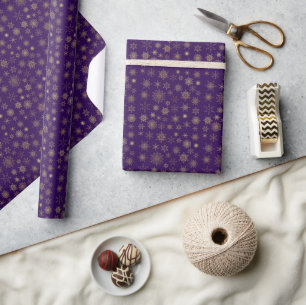 Papier Cadeau Noël des flocs à neige en or