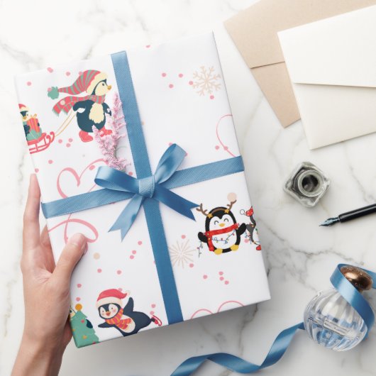Papier Cadeau Noël des pingouins plein de coeur (Cadeaux)