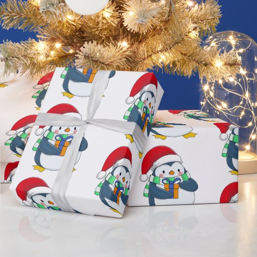 Papier Cadeau Penguin dans un casquette de Noël avec un cadeau (Vacances)