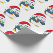 Papier Cadeau Penguin dans un casquette de Noël avec un cadeau (Coin)