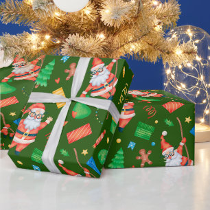 Papier Cadeau Père Noël de Noël drôle avec des cadeaux verts