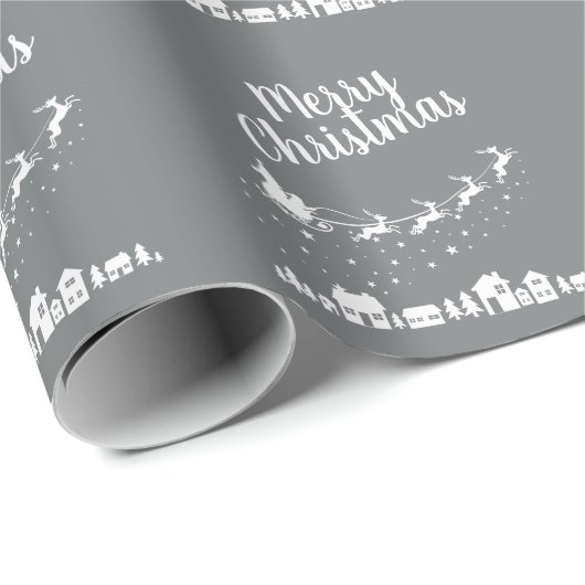 Papier Cadeau Père Noël en traîneau avec rennes au-dessus des ma (Coin rond)