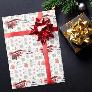 Papier Cadeau Père Noël pilotant un avion, Premier Noël personna