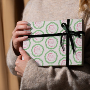 Papier Cadeau père Noël rose vintage encadrée par une couronne v