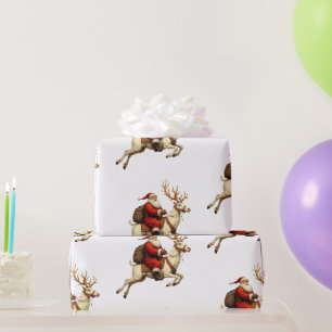 Papier Cadeau Père Noël volant avec rennes