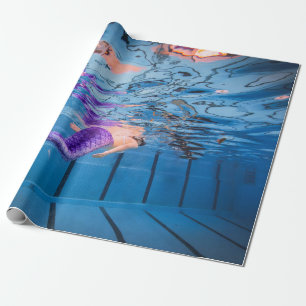 Papier Cadeau Personne en pantalon violet allongée sur hamac ble