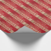 Papier Cadeau Poignée drôle avec soin, signe fragile (Coin)