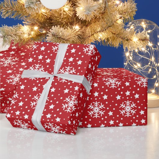 PAPIER CADEAU ROUGE AVEC DES DRAPEAUX DE NOËL BLANCS (Vacances)