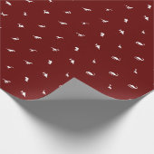 Papier Cadeau Rouge foncé avec silhouettes de dinosaure blanc (Coin)