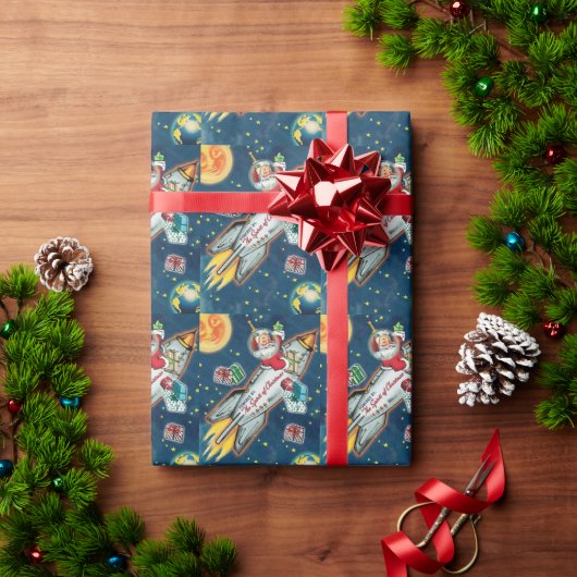 Papier Cadeau Santa Claus dans Rocket Ship Earth Moon Stars (Cadeau de vacances)