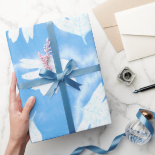PAPIER CADEAU SIMPLE SKI BLEU AVEC COULEUR D'EAU FEUILLE BLANCHE