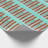 PAPIER CADEAU SKIS ROUGE AVEC NEIGE SUR PAPIER EN WRAPPER BLEU (Coin)