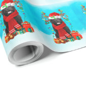 Papier Cadeau Terre-Neuve dans la neige avec cadeaux de Noël (Coin rond)