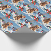 Papier Cadeau Terrier rouillé en neige avec Casquette de Noël (Coin)