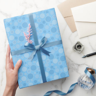 Papier Cadeau tons bleu vif avec pois dans les années 60 rétro